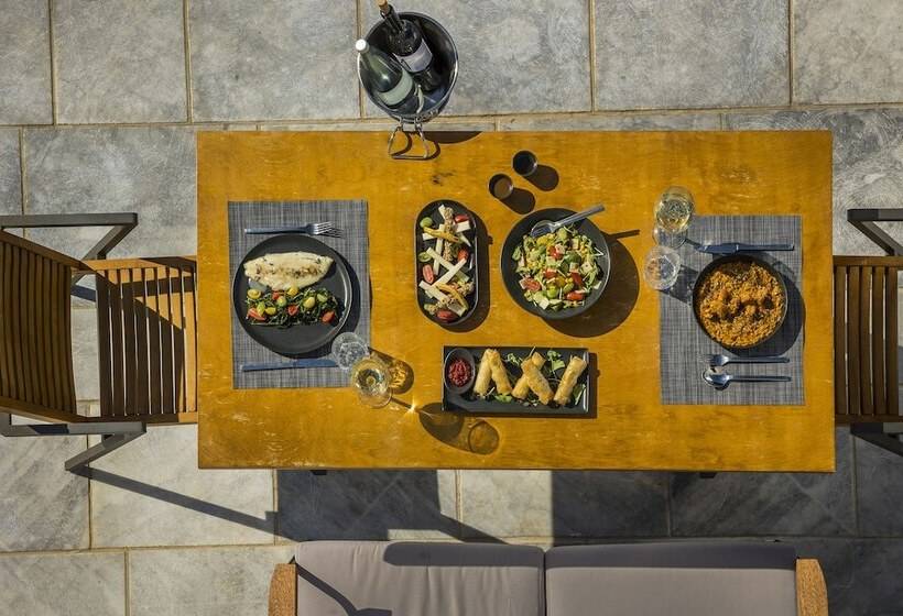 Отель Ariá Estate Suites & Spa