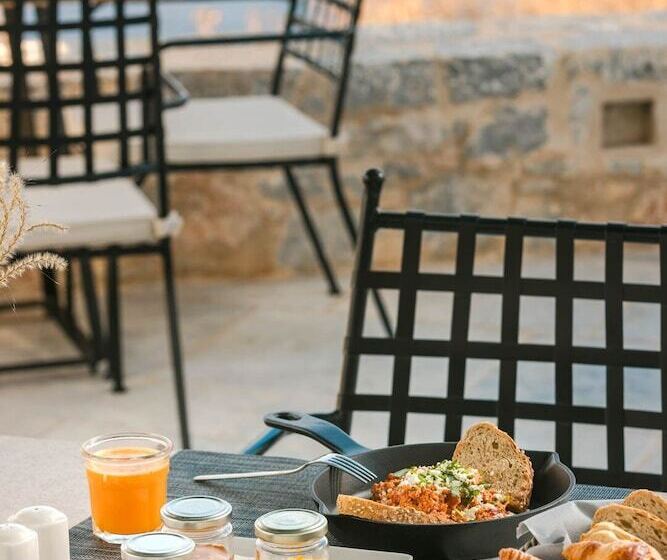 Отель Ariá Estate Suites & Spa