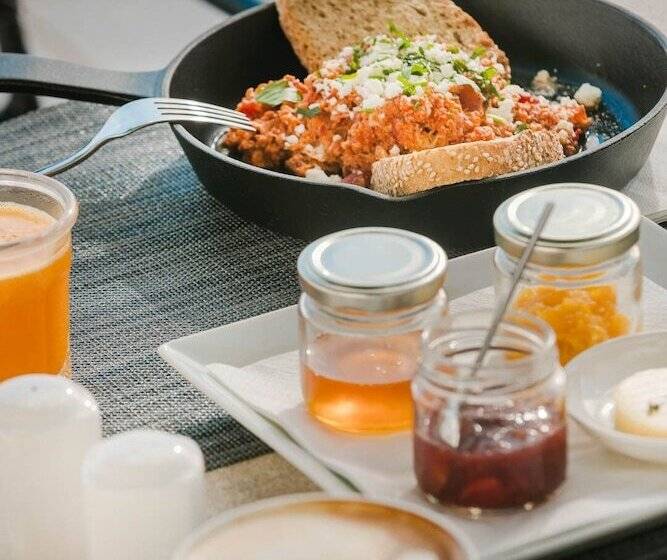 Отель Ariá Estate Suites & Spa