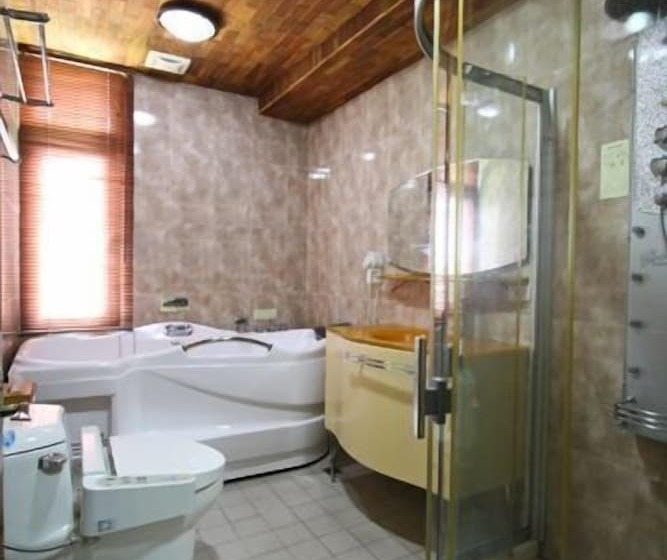 تختخواب و صبحانه Cao Ling Jiao Villa