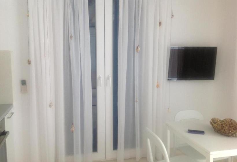 Отель Blue, White And Grey Suites