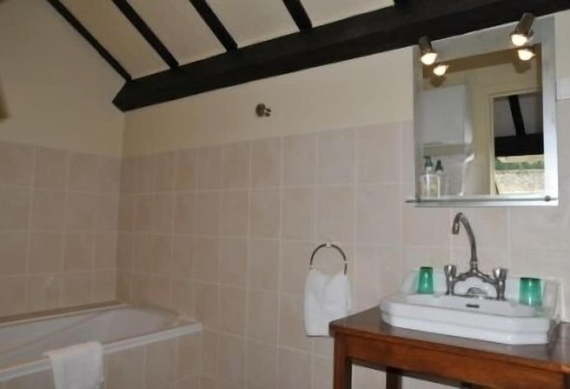 호텔 Logis Hôtel Restaurant L Auberge Du Chateau