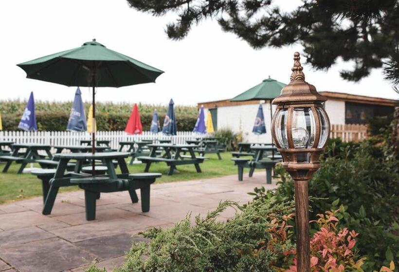 فندق صغير Three Horseshoes Inn