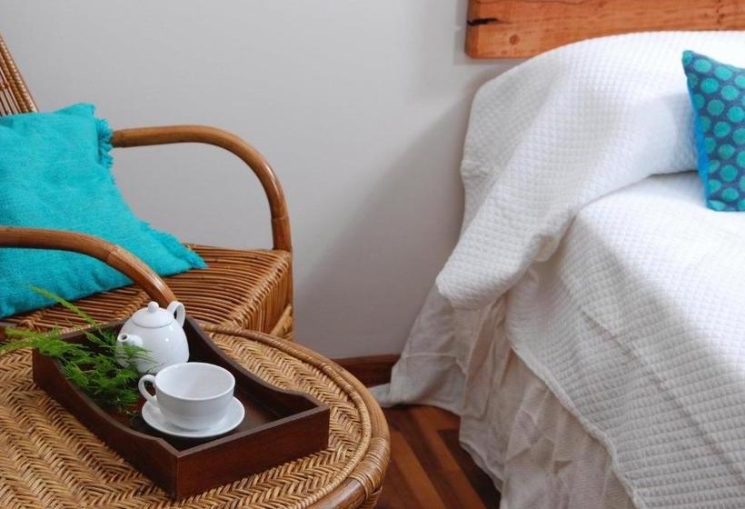 Río Arriba Suites & Apartments & Restó