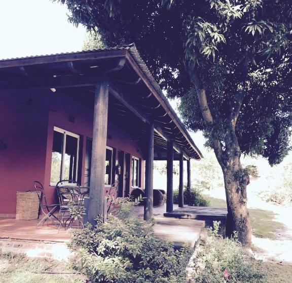 Río Arriba Suites & Apartments & Restó