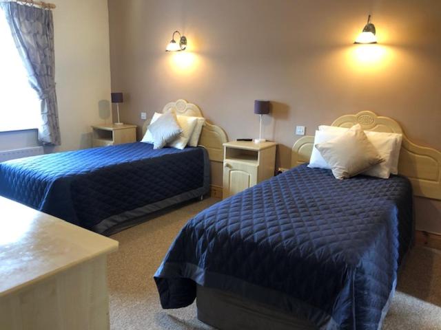 פנסיון The Courtyard Guesthouse B&b