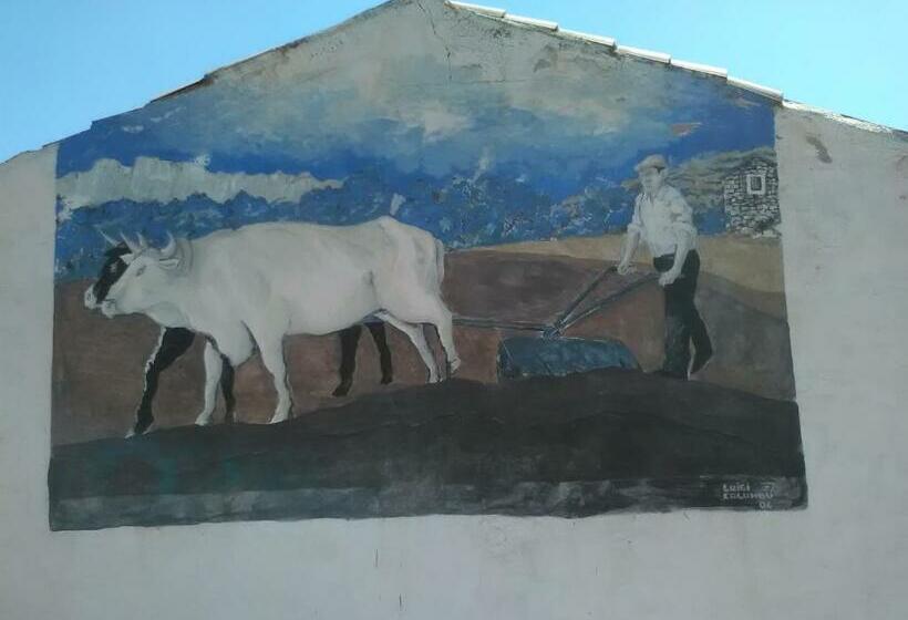 בית מלון כפרי Camisadu