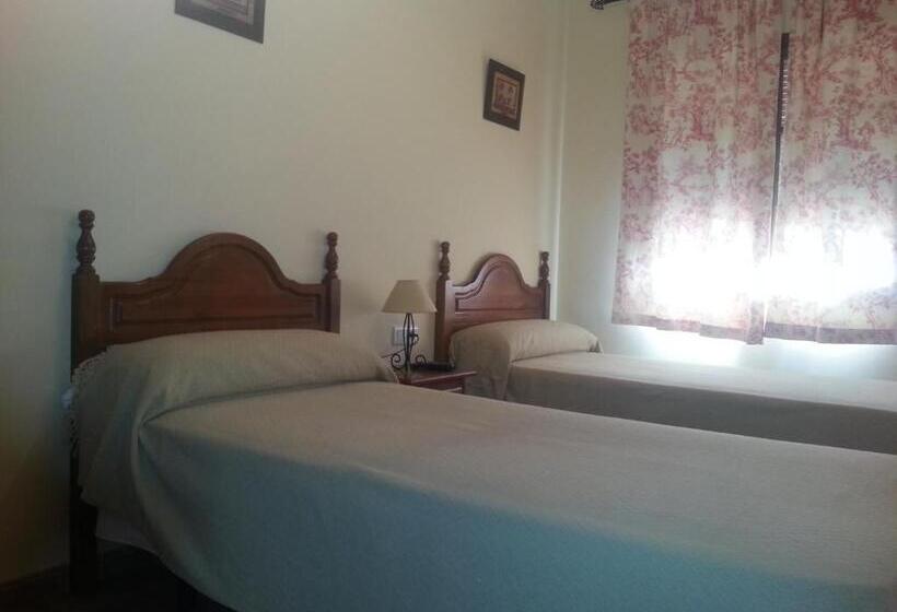 Pensión Y Apartamentos El Taxi