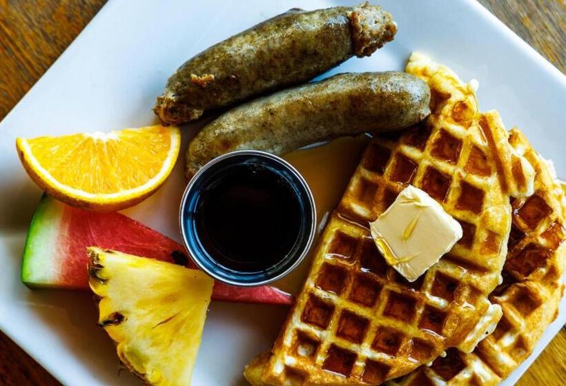 פנסיון Coconut Row Boutique