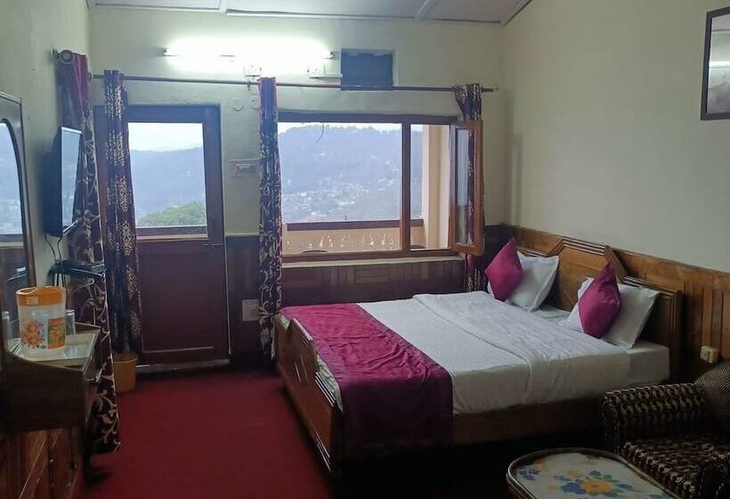 Отель Goroomgo Tribhuwan Ranikhet