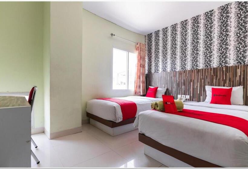 Пансион Reddoorz Plus @ Hertasning Area