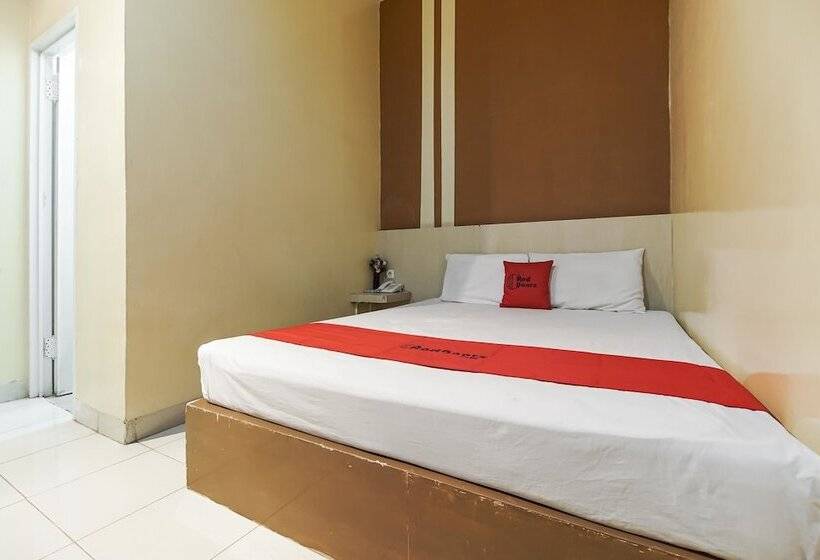 Пансион Reddoorz Plus @ Hertasning Area