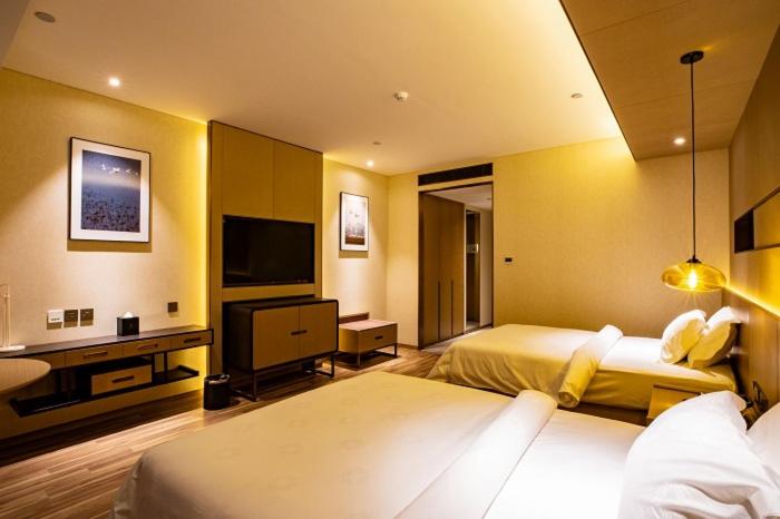 هتل Metropolo Jinjiang Weihai Railway Station