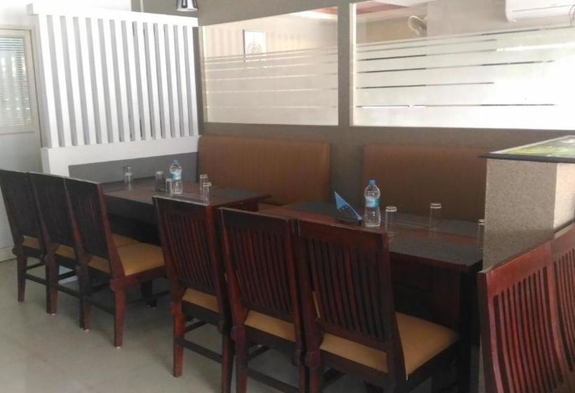 호텔 The Orchid Suites