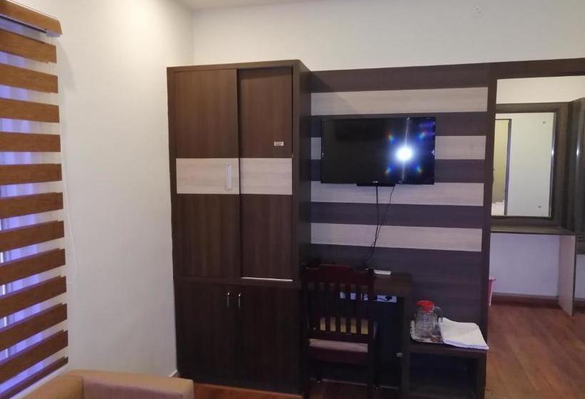 호텔 The Orchid Suites