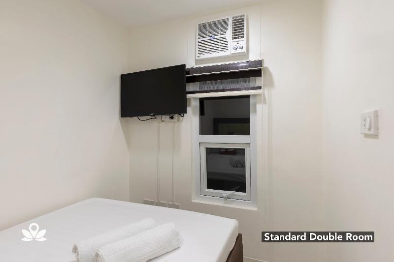 Zen Rooms Triangle Hotel Manila