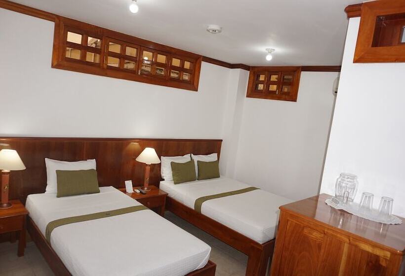 تختخواب و صبحانه Hostal Macaw