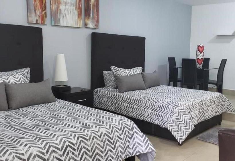 Отель Capital Olowe Suites