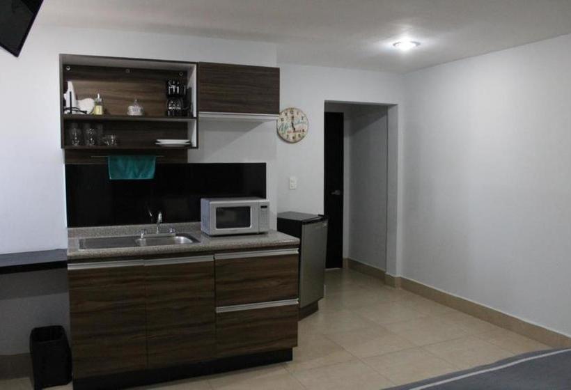 Отель Capital Olowe Suites