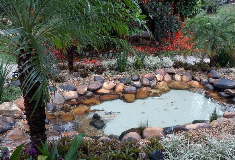 펜션 Pousada Cachoeira Poço Encantado