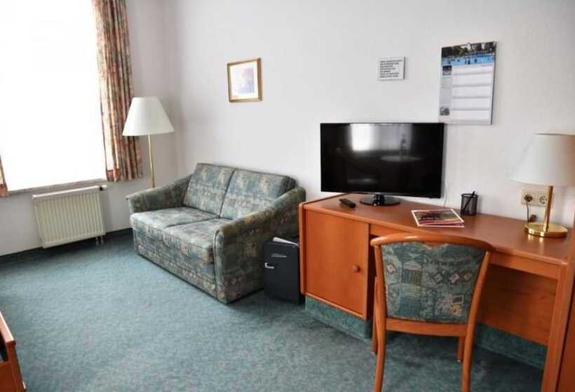 Отель Pension Am Kurpark