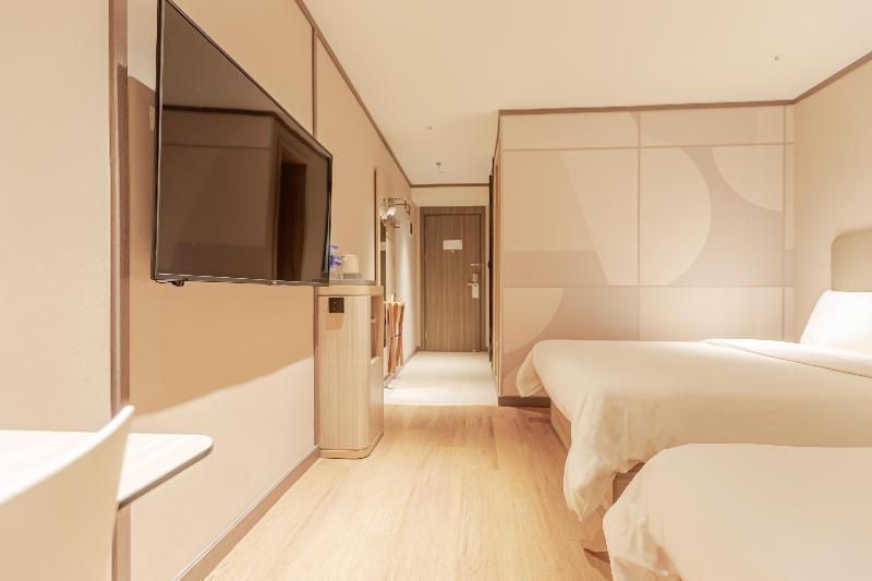 בית מלון כפרי Hanting  Changchun Hongqi Street Wanda