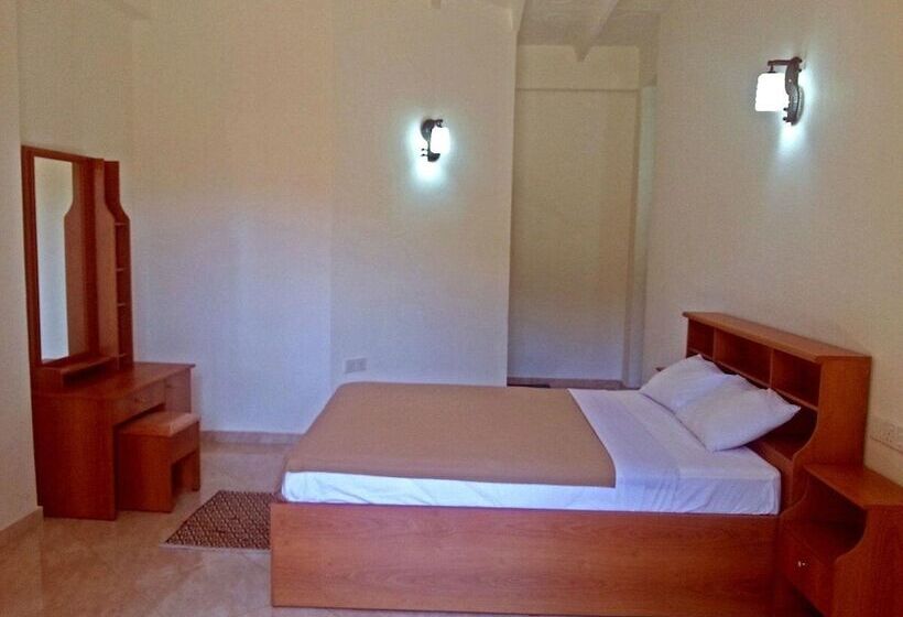 Отель Slightly Chilled Yellow House