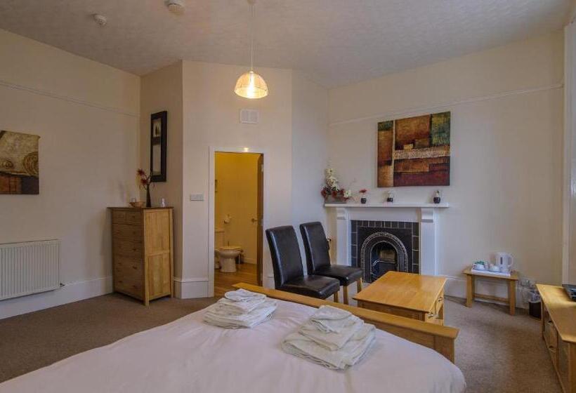 فندق صغير Cheers Cafe Bar & Tavern