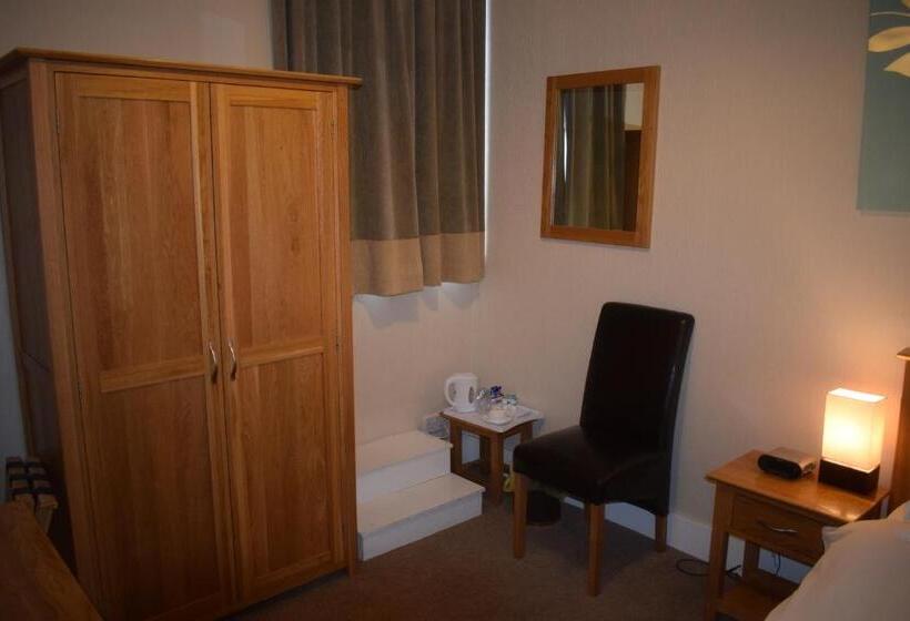 فندق صغير Cheers Cafe Bar & Tavern