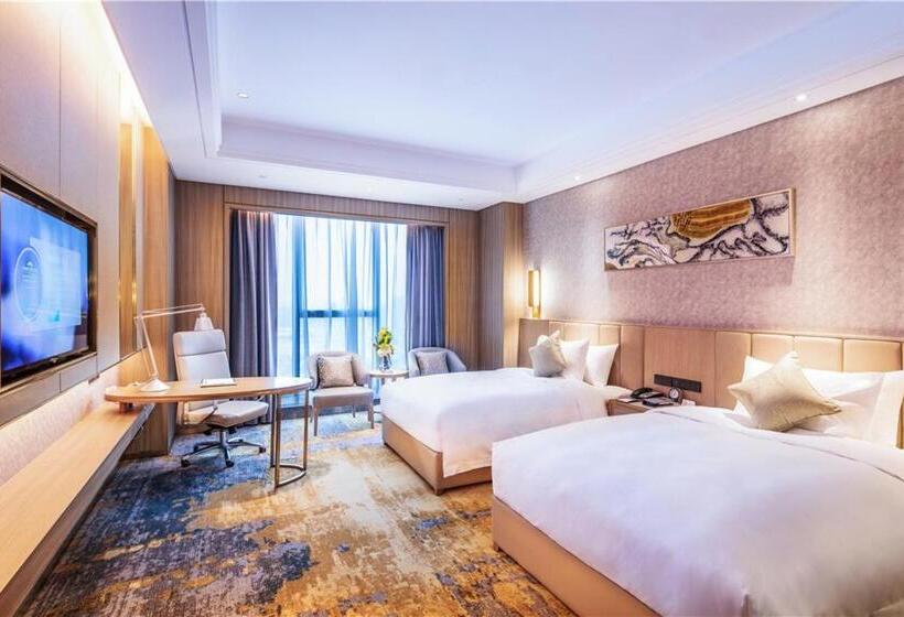 Отель Howard Johnson New District Plaza Ziyang