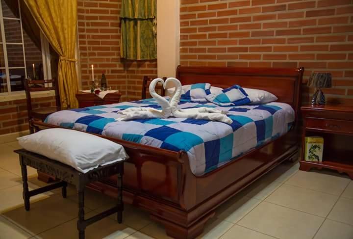 펜션 Hostal Casa Cultural Mindo