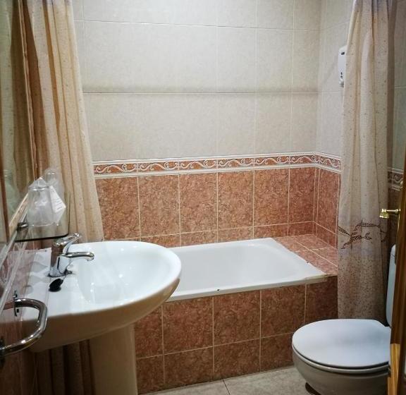 펜션 Hostal Restaurante El Chato