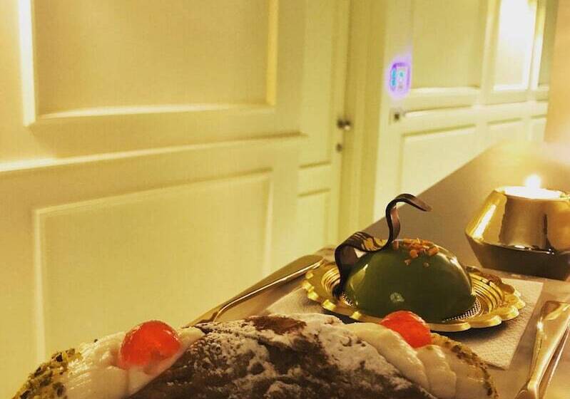 بنسيون Quattro Canti Suites