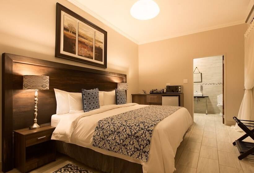 פנסיון Three Olives Guesthouse