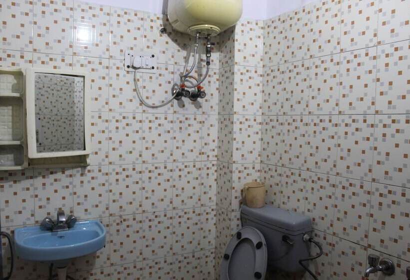 호스텔 Rajdhani Inn