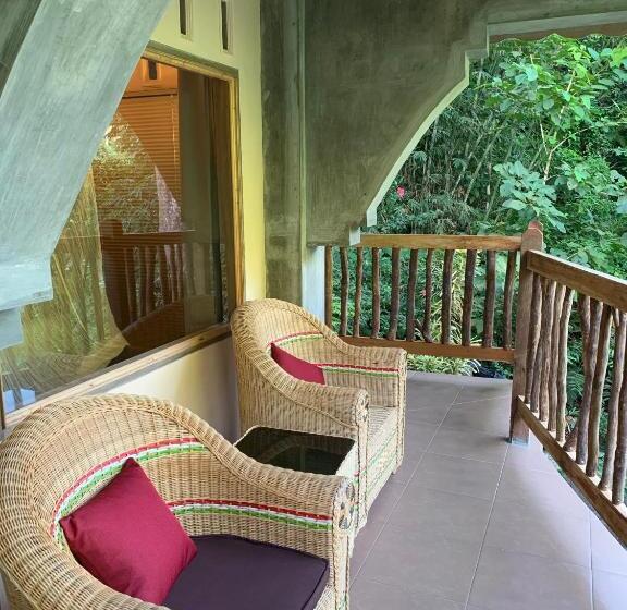 펜션 Kupu Kupu Garden Guest House & Cafe