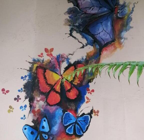 펜션 Kupu Kupu Garden Guest House & Cafe