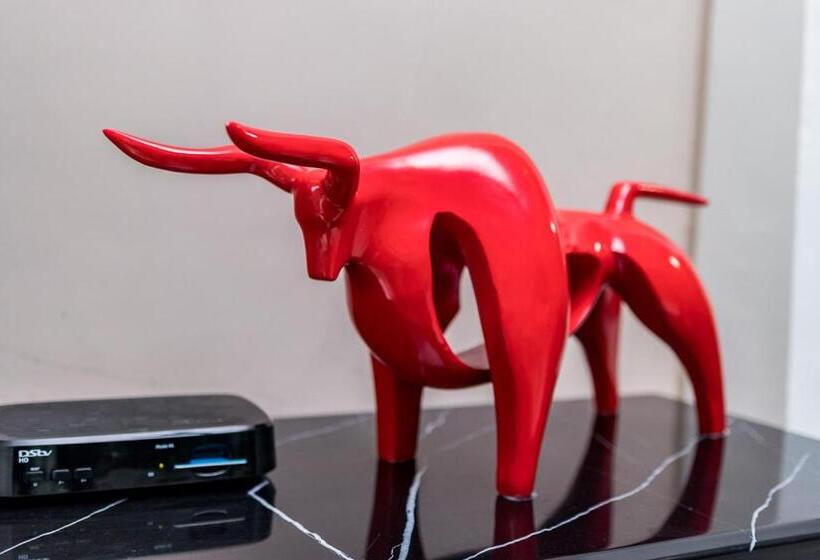 Red Mango Hotel And Apartments