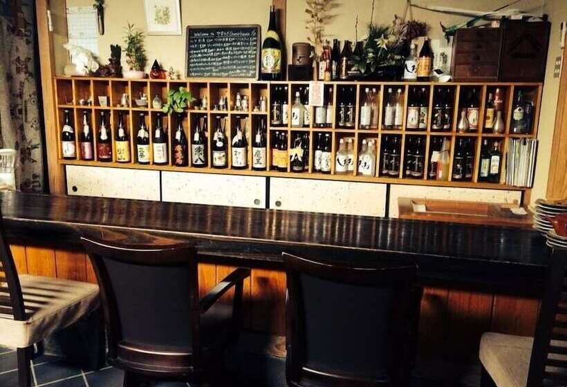 펜션 Yasuragi Guest House & Bar