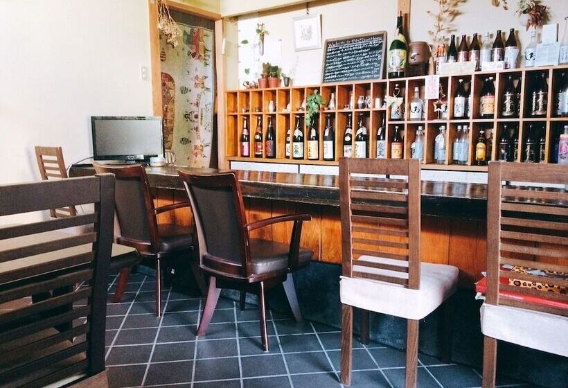 펜션 Yasuragi Guest House & Bar