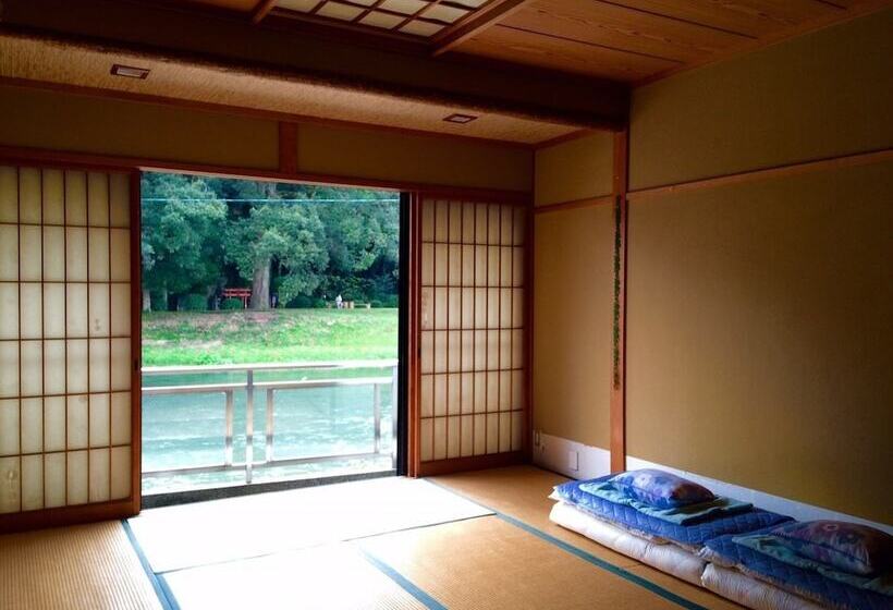 펜션 Yasuragi Guest House & Bar