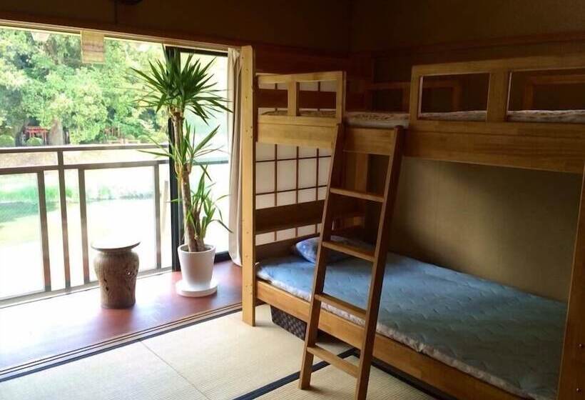 펜션 Yasuragi Guest House & Bar