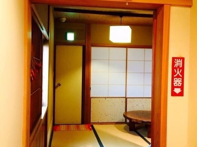 펜션 Yasuragi Guest House & Bar