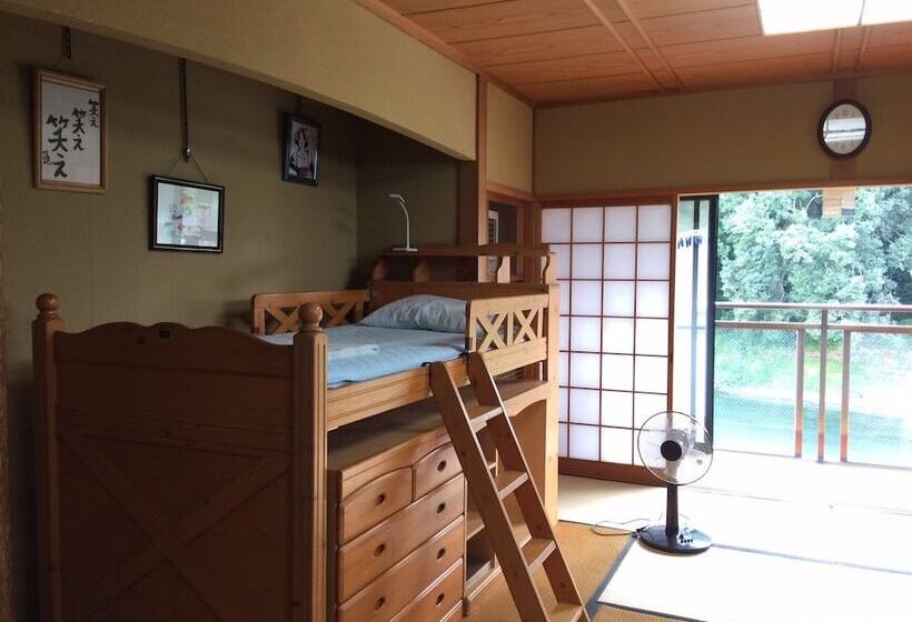 펜션 Yasuragi Guest House & Bar