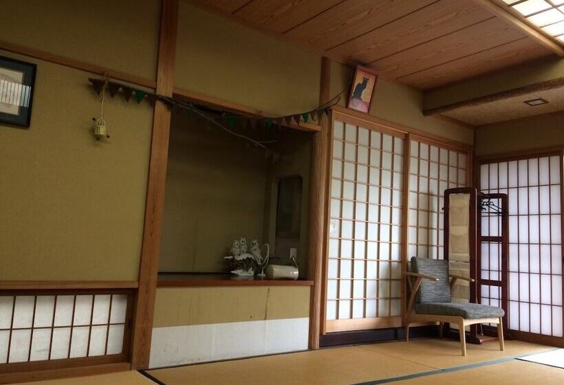 펜션 Yasuragi Guest House & Bar