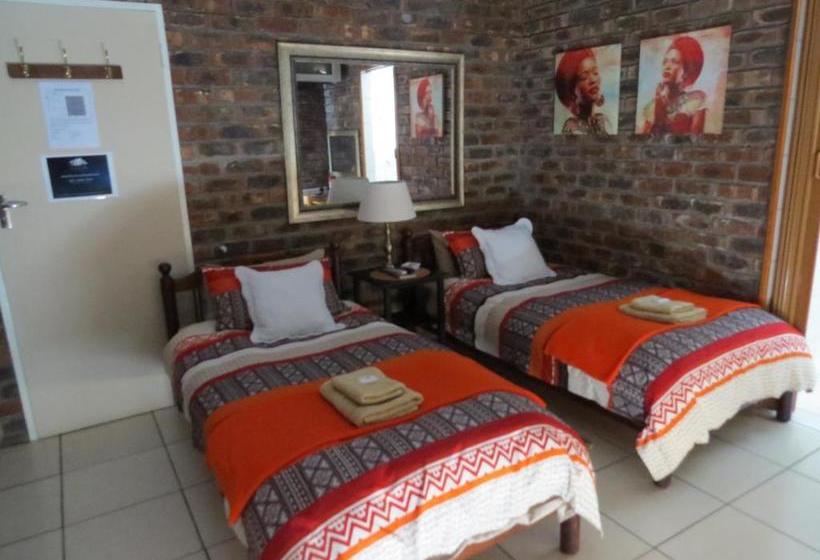 Пансион Coral Tree Guest Rooms