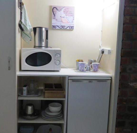 Пансион Coral Tree Guest Rooms