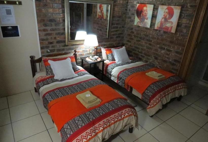 Пансион Coral Tree Guest Rooms