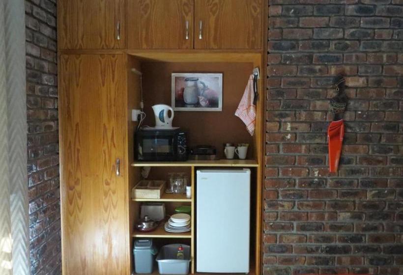 بنسيون Coral Tree Guest Rooms