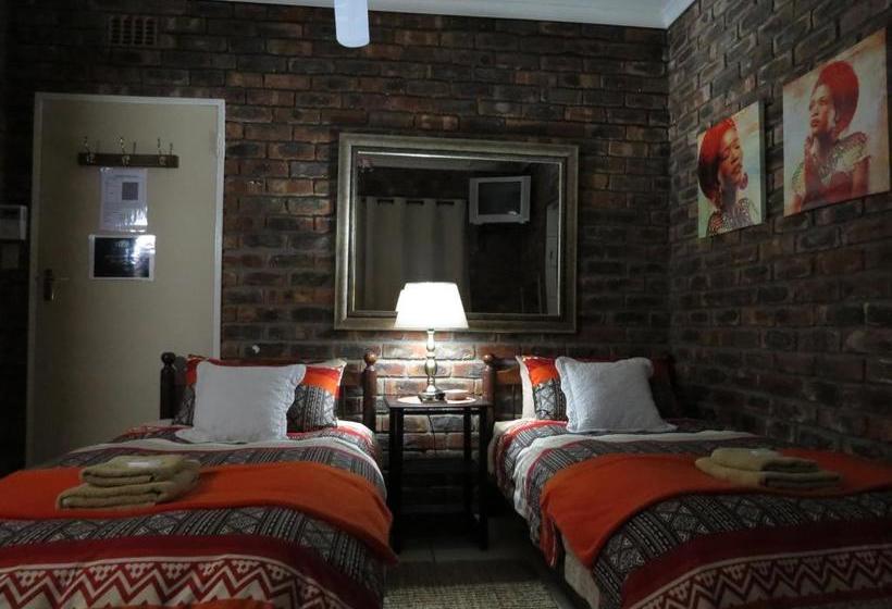 Пансион Coral Tree Guest Rooms